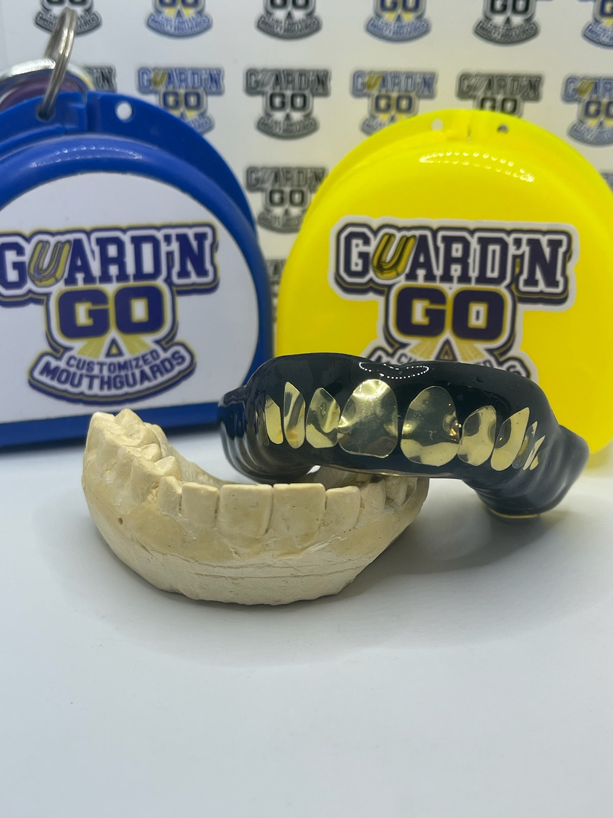 Metallic Gold Grill: Black/Gold